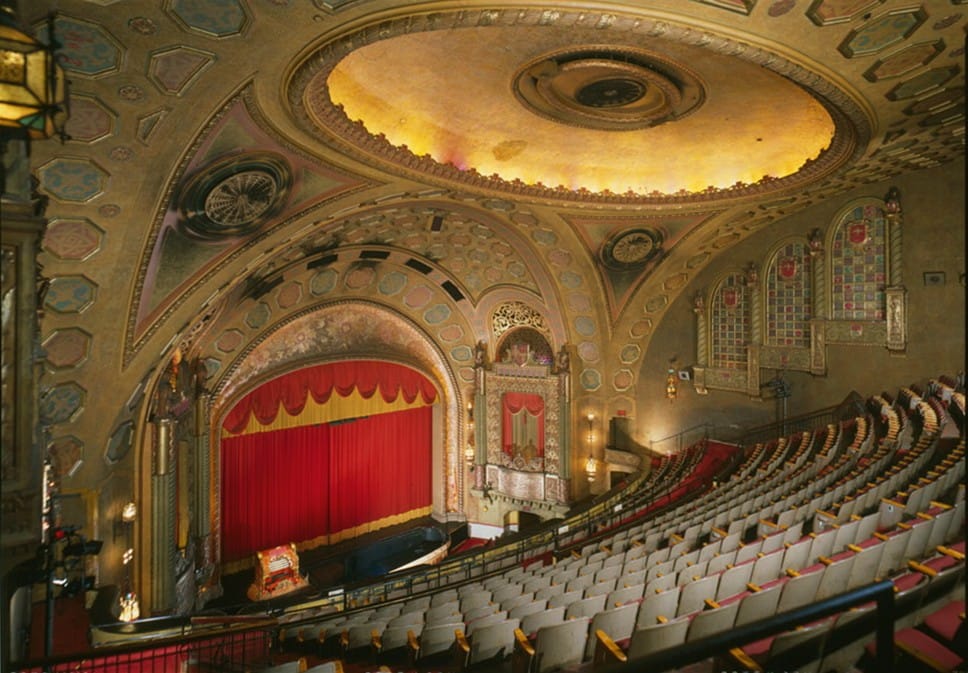The Alabama Theatre's auditorium seen from the balcony, showing the domed ceiling, proscenium and seating, Birmingham, Alabama.