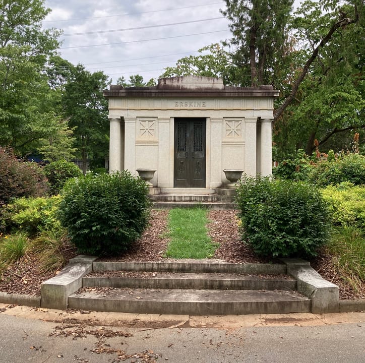 Older section of Maple Hill Cemetery in Huntsville, Alabama, featuring the Bibb obelisk and historic markers