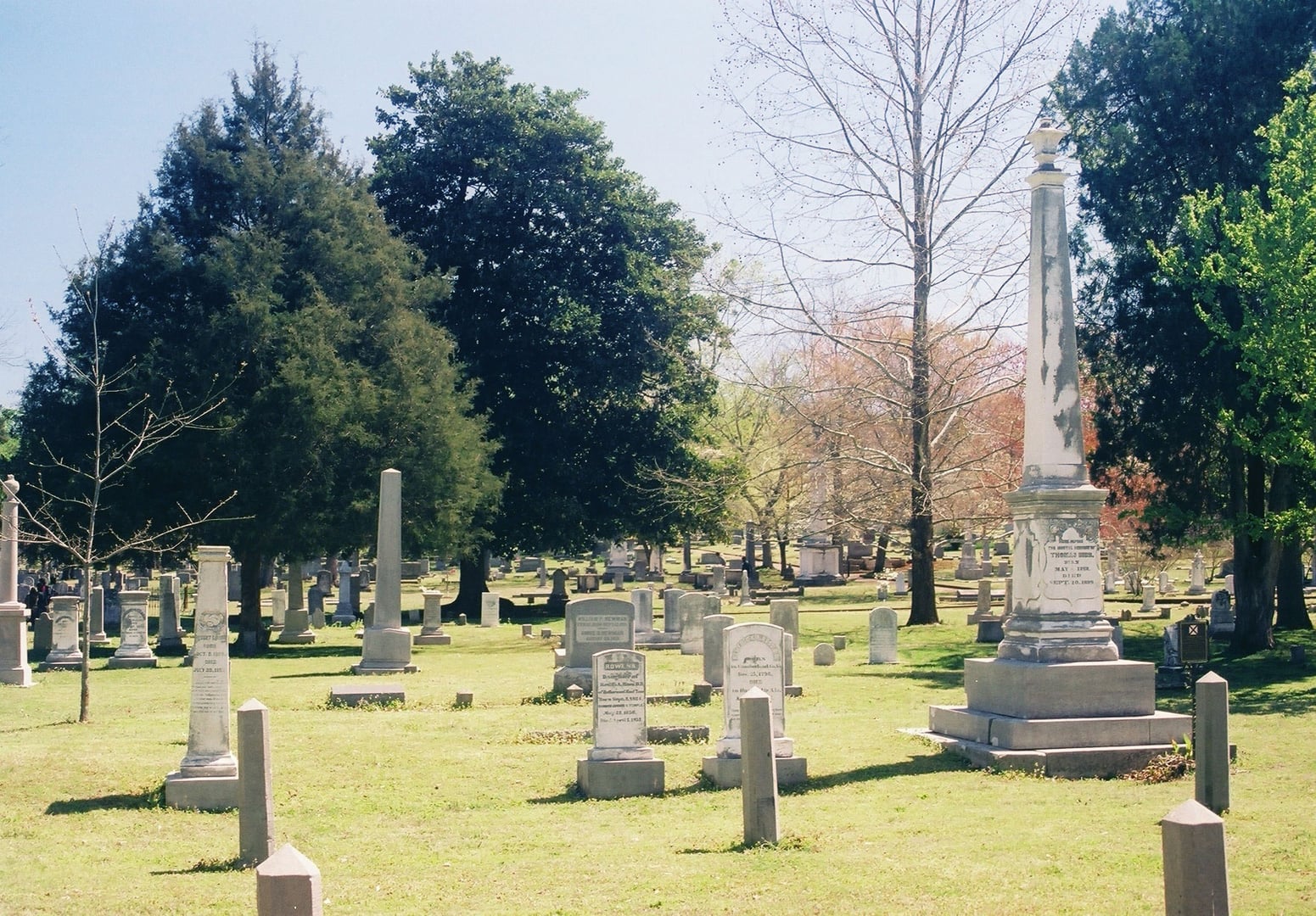 Older section of Maple Hill Cemetery in Huntsville, Alabama, featuring the Bibb obelisk and historic markers