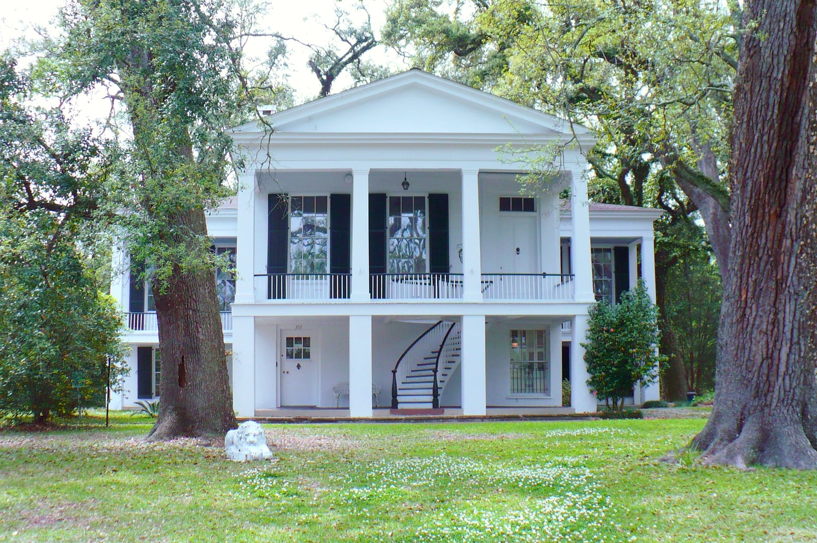 T-shaped Greek Revival raised villa of the Oakleigh House Museum, built 1833, in the Oakleigh Garden Historic District of Mobile, Alabama.