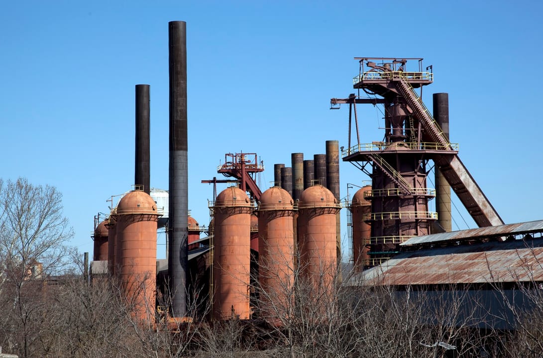 The cluster of blast-furnace stoves and the furnace tower at Sloss Furnaces National Historic Landmark, Birmingham, Alabama, 2010.