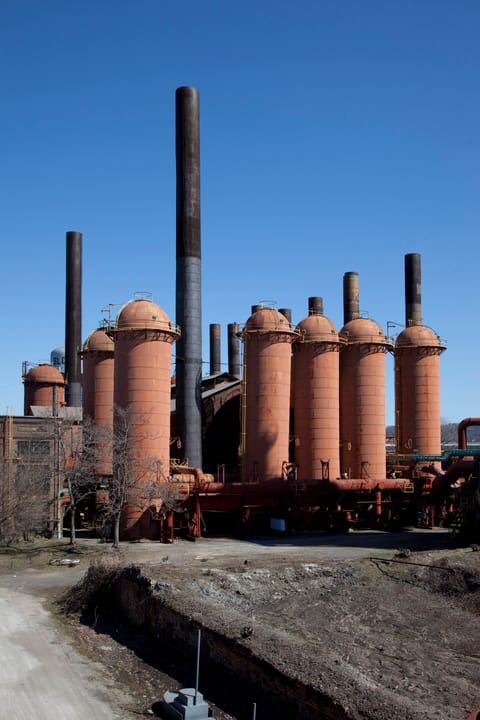 A vertical view of the furnace stoves and smokestacks at Sloss Furnaces, Birmingham, Alabama, 2010.