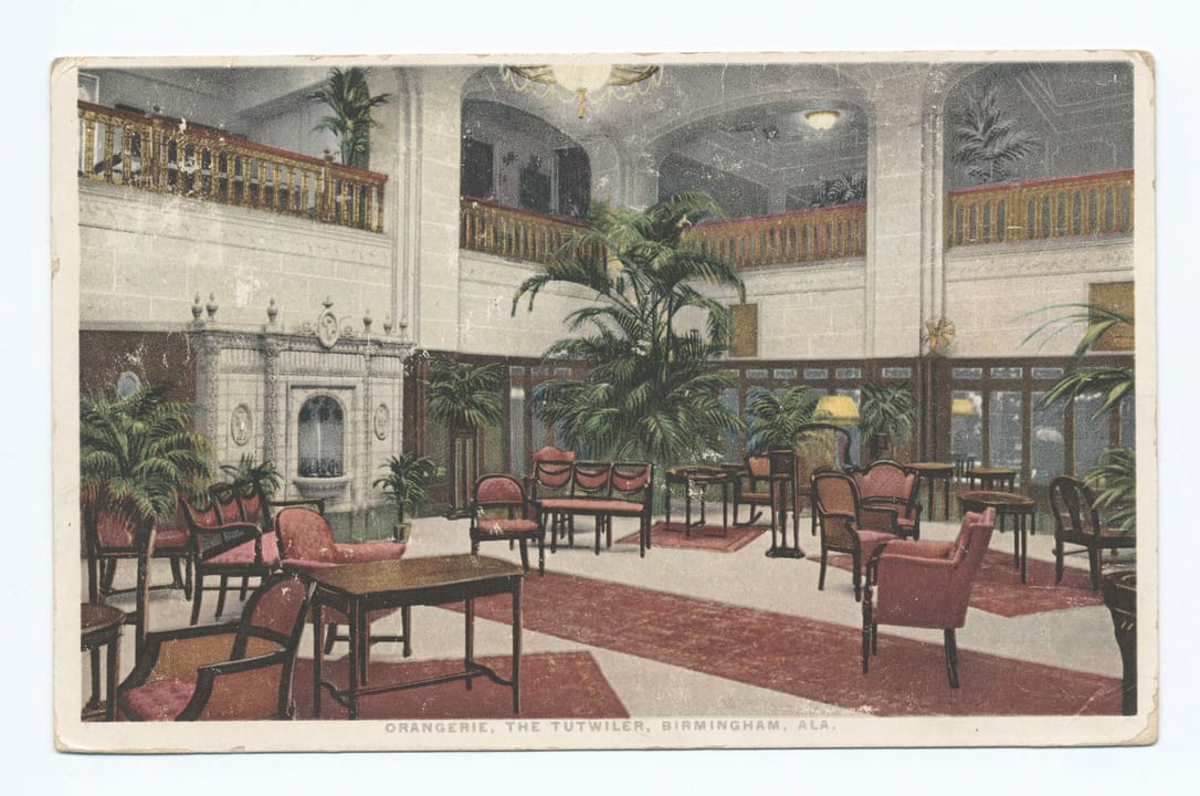 The Tutwiler's plant-filled orangerie sitting room, Birmingham, Alabama, on an early-20th-century colour postcard (NYPL collection).