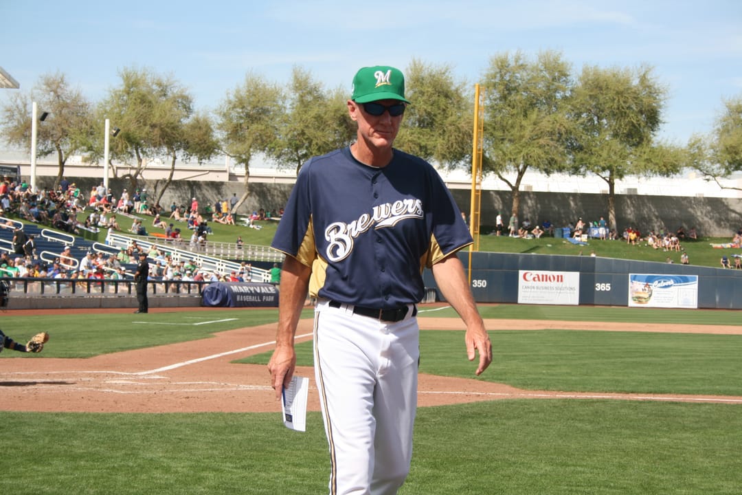 Brewers Manager Ron Roenicke walking back to his seat during spring training.