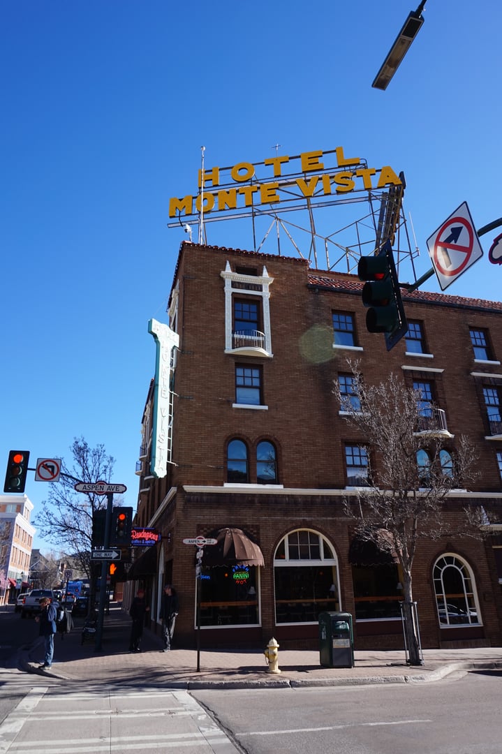 Hotel Monte Vista brick facade with vintage neon sign in downtown Flagstaff, Arizona