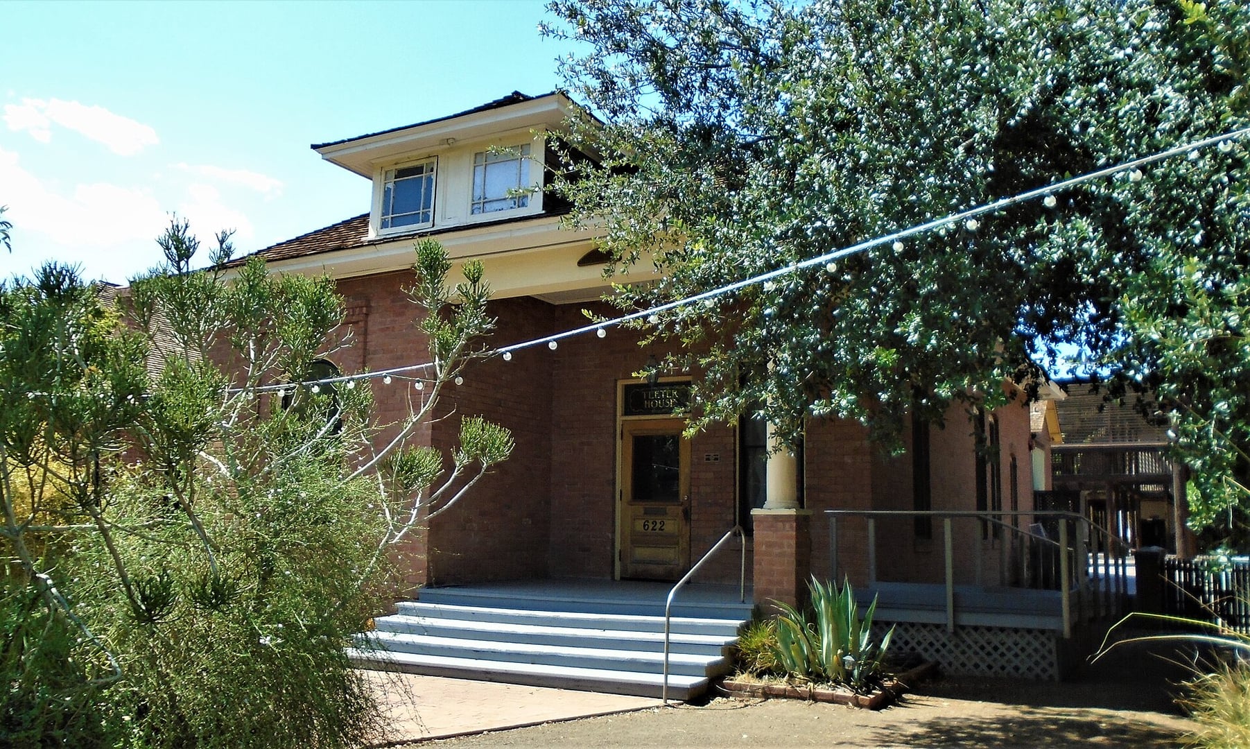Exterior of the Bouvier-Teeter House, an 1899 Midwestern-style bungalow at 622 E Adams Street in Phoenix's Heritage Square, now home to Nobuo at Teeter House restaurant