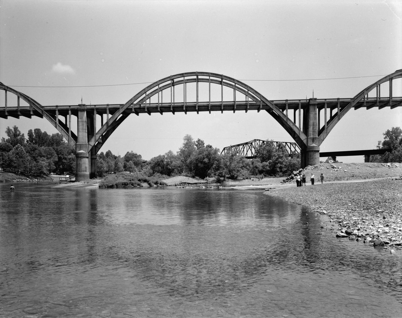 The Cotter Bridge's concrete rainbow arches spanning the White River near Cotter, Arkansas