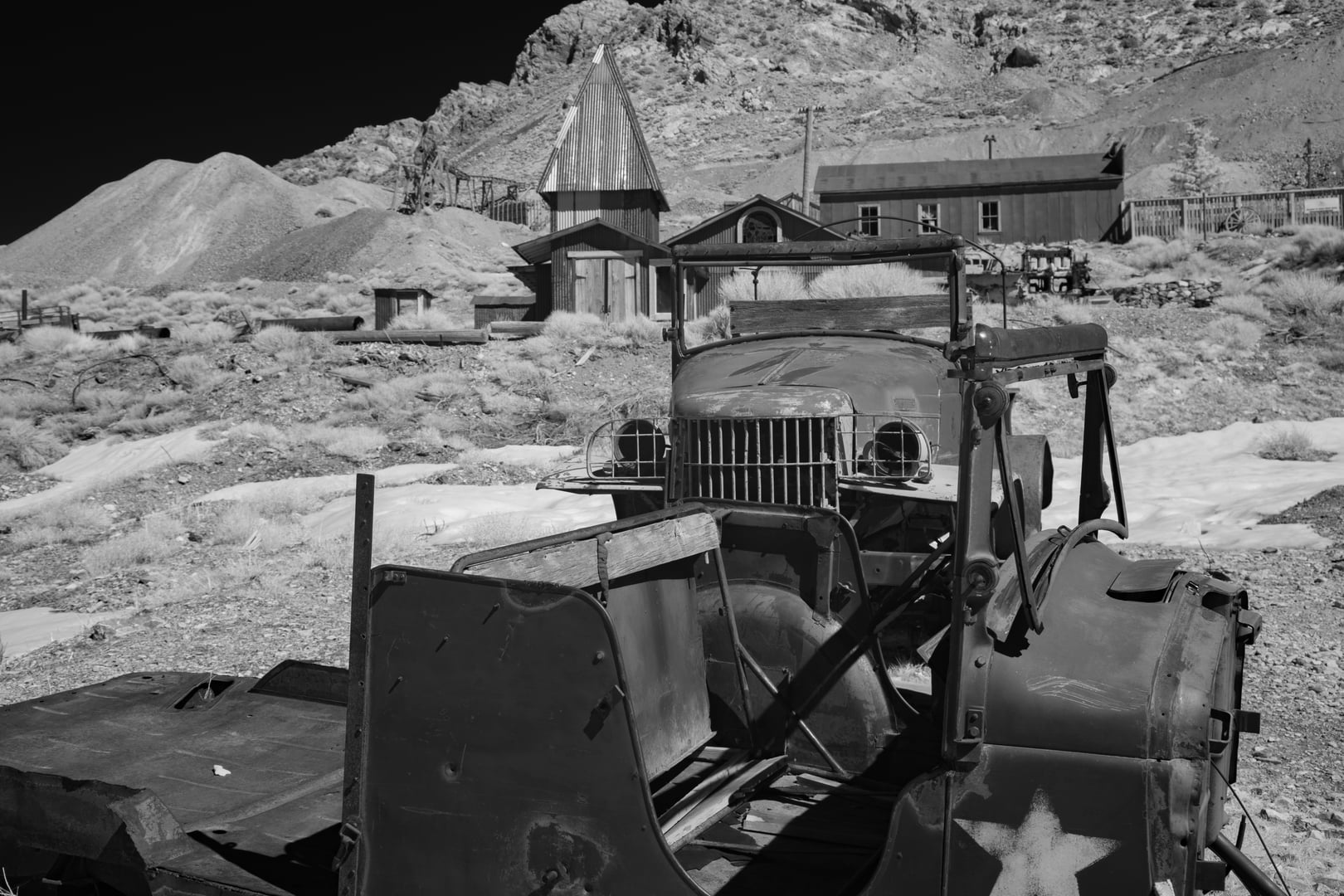 Main street of the silver-mining ghost town of Cerro Gordo, Looking E to mine dumps and Cerro Gordo Peak, Inyo County, CA, USA