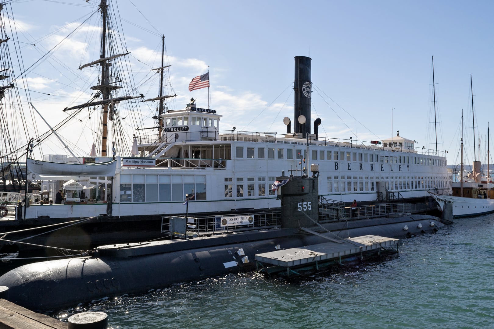 The 1898 steam ferryboat Berkeley docked at the Maritime Museum of San Diego, with the USS Dolphin submarine alongside