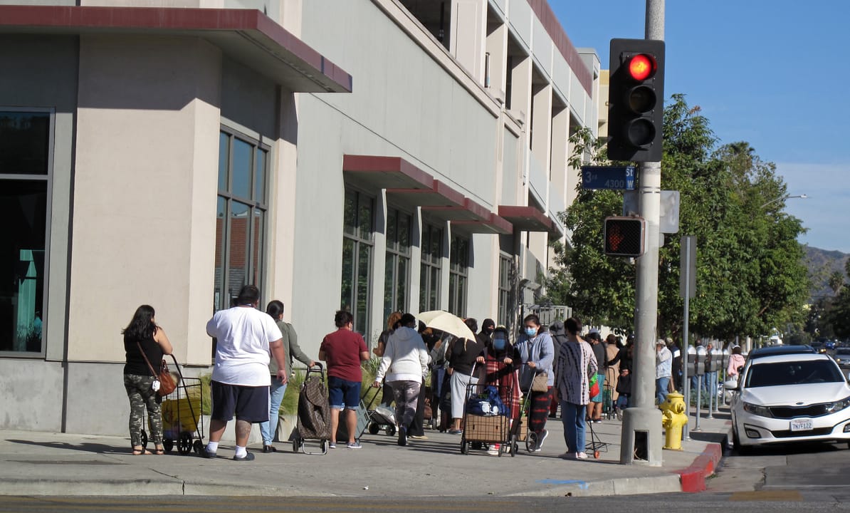 People line up for distribution of vegetables and fruits, Anderson-Munger YMCA, Los Angeles, during COVID-19 pandemic