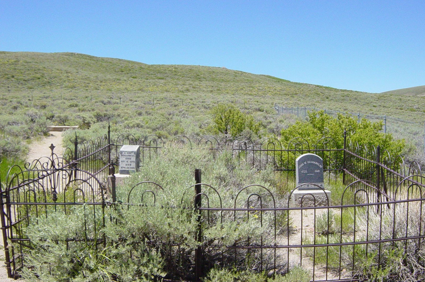 Bodie Cemetery weathered wooden grave markers and headstones in the Sierra Nevada ghost town, Bodie State Historic Park, California