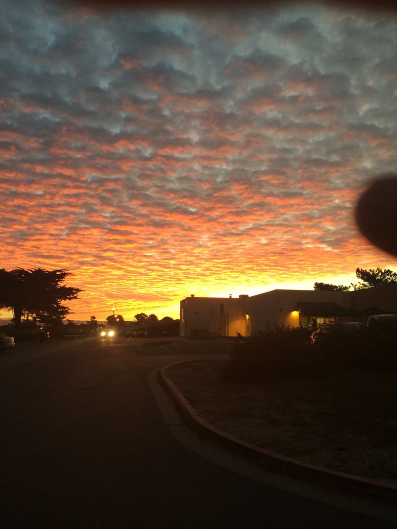 The Monterey sky lights up as the sun sets of the CSUMB campus.