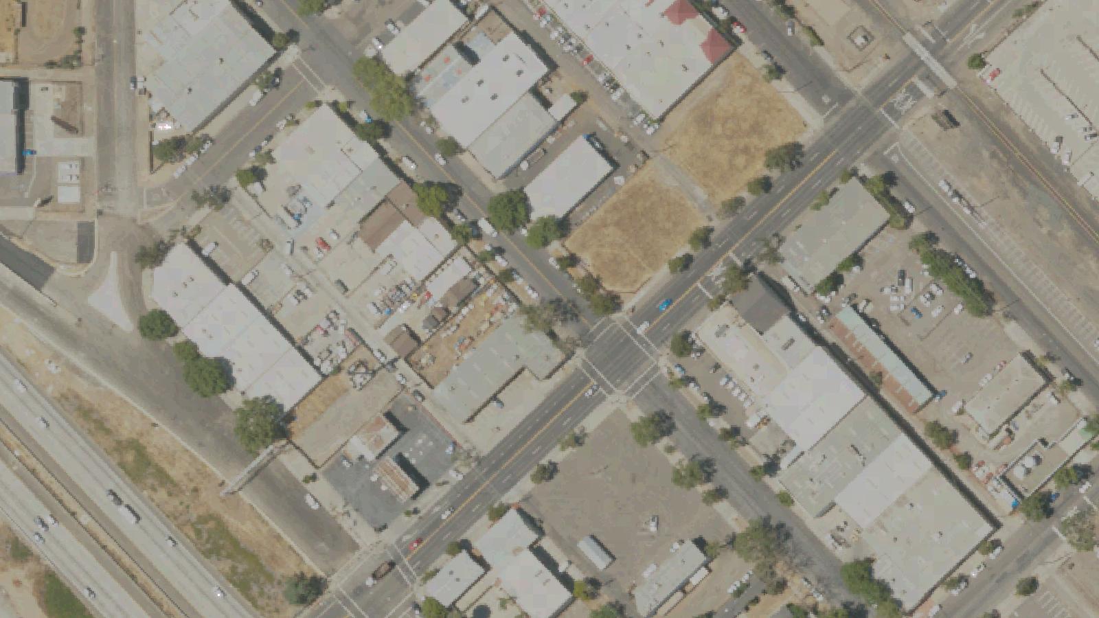 Aerial survey view of Daydreams & Nightmares Costume Shop (former Evans Funeral Home)