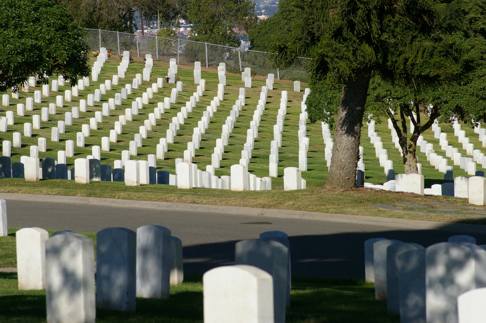 Rows of white headstones at Fort Rosecrans National Cemetery on Point Loma, San Diego