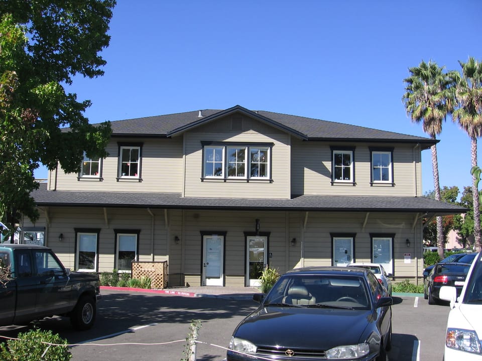 This building in "Railroad Square" may have once served as a freight depot for the nearby Southern Pacific Station.  It is at 55 West Angela Street in Pleasanton, California, USA.