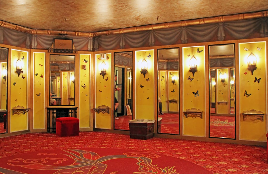 Interior lobby alcove with gold mirrored panels and a butterfly motif, inside the Chinese Theatre, 2014.
