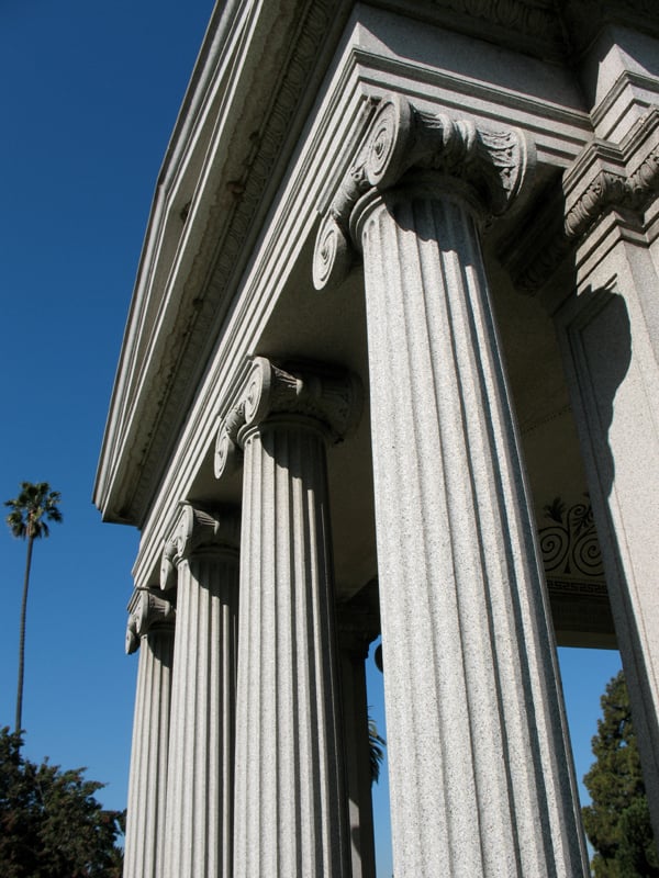 The white granite chapel and tree-lined grounds of Inglewood Park Cemetery in Inglewood, California