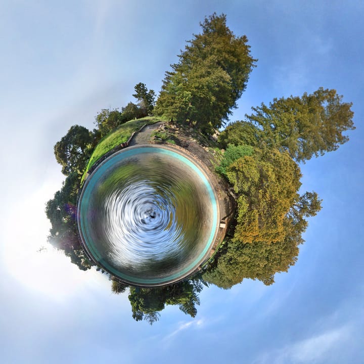 An improved version of my Joaquin Miller Park fountain planet.

This time I used the Flaming Pear &quot;Flood&quot; plugin to create the water before doing the stereographic projection in Hugin and I think it came out much better. I also tried to adjust the sky a little more, but it's still not perf