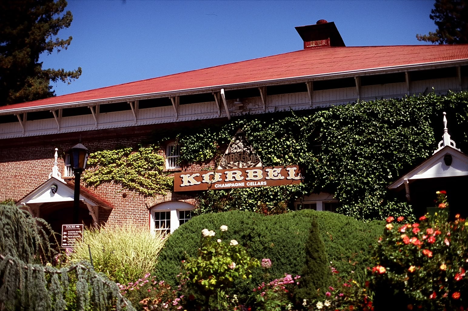 Exterior of the historic brick Korbel Champagne Cellars winery building in Guerneville, California