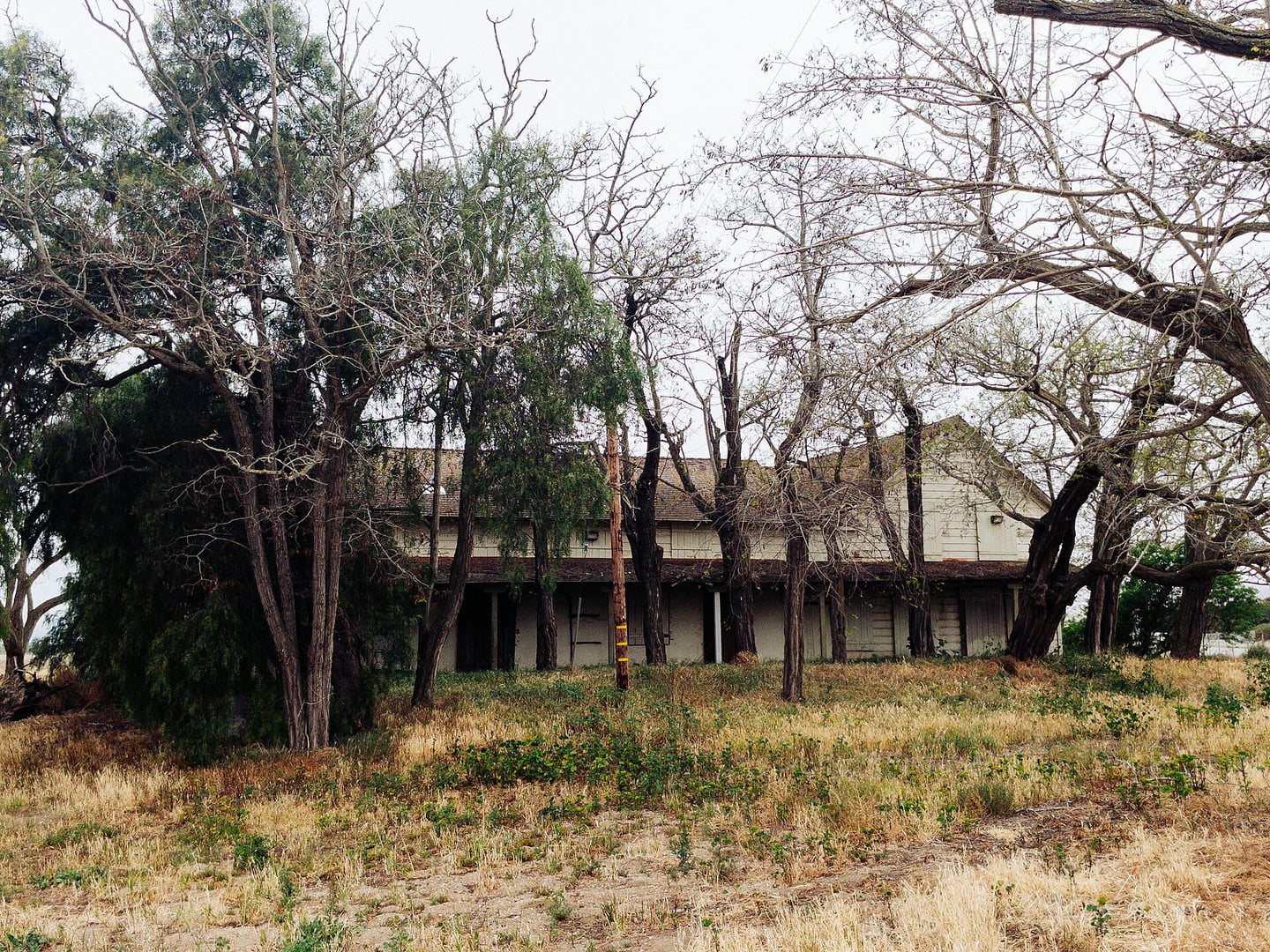 Los Coches Adobe in Soledad, California — surviving 1843 stagecoach inn and California Historical Landmark with thick earthen walls and hipped roof