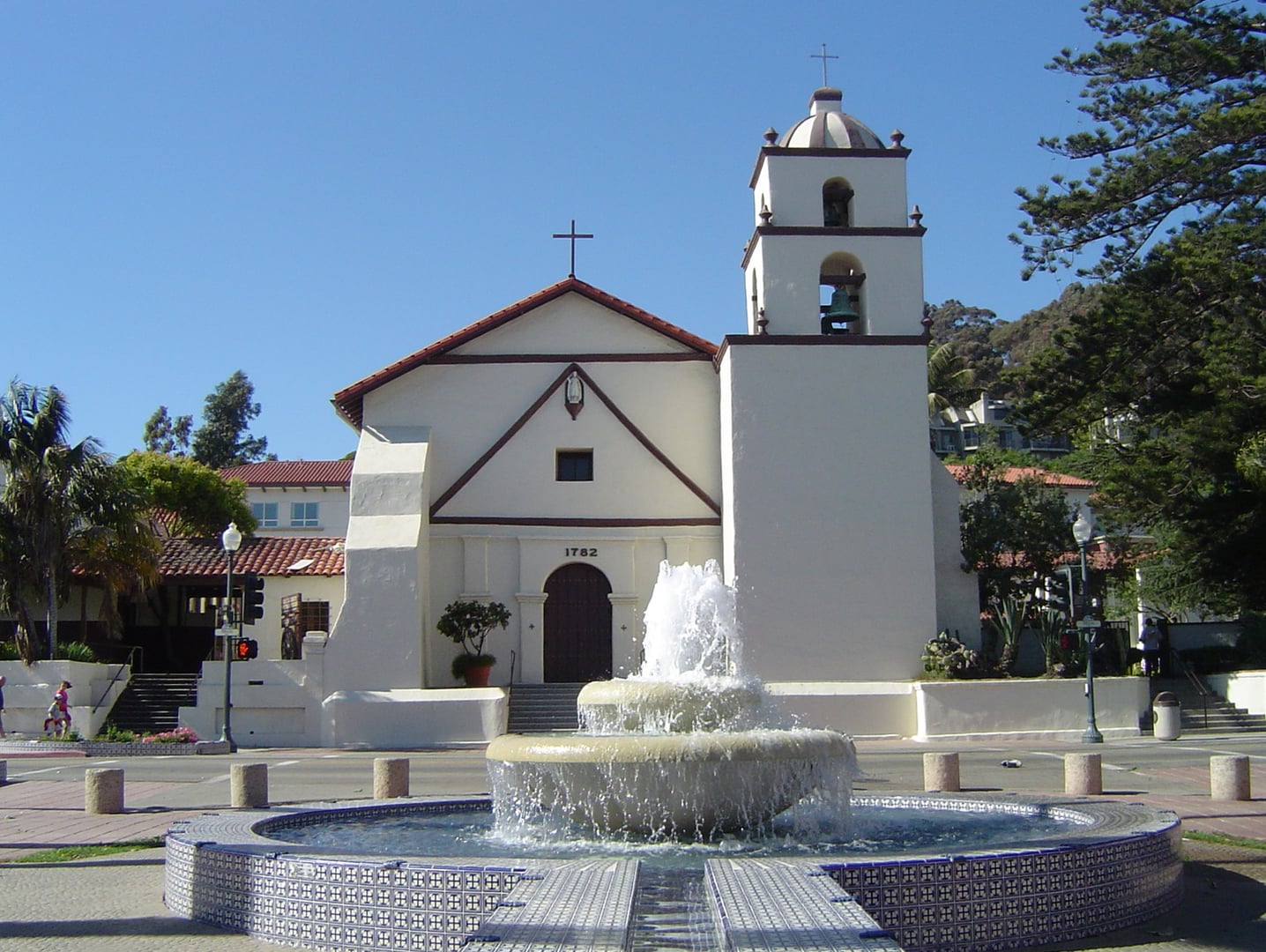 The white facade and bell tower of Mission Basilica San Buenaventura on East Main Street in Ventura, California (HABS CA-22)