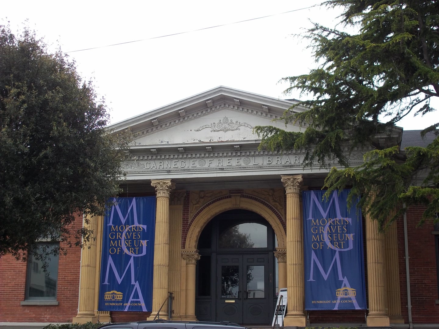 Front facade of the Morris Graves Museum of Art, the former Carnegie Free Library in Eureka, California, a Classical Revival brick building