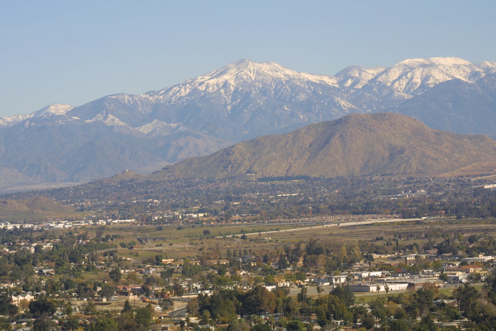 Southeast landscape view of Mount Rubidoux and the city of Riverside, California from Indian Hills, with the San Gabriel Mountains in the distance