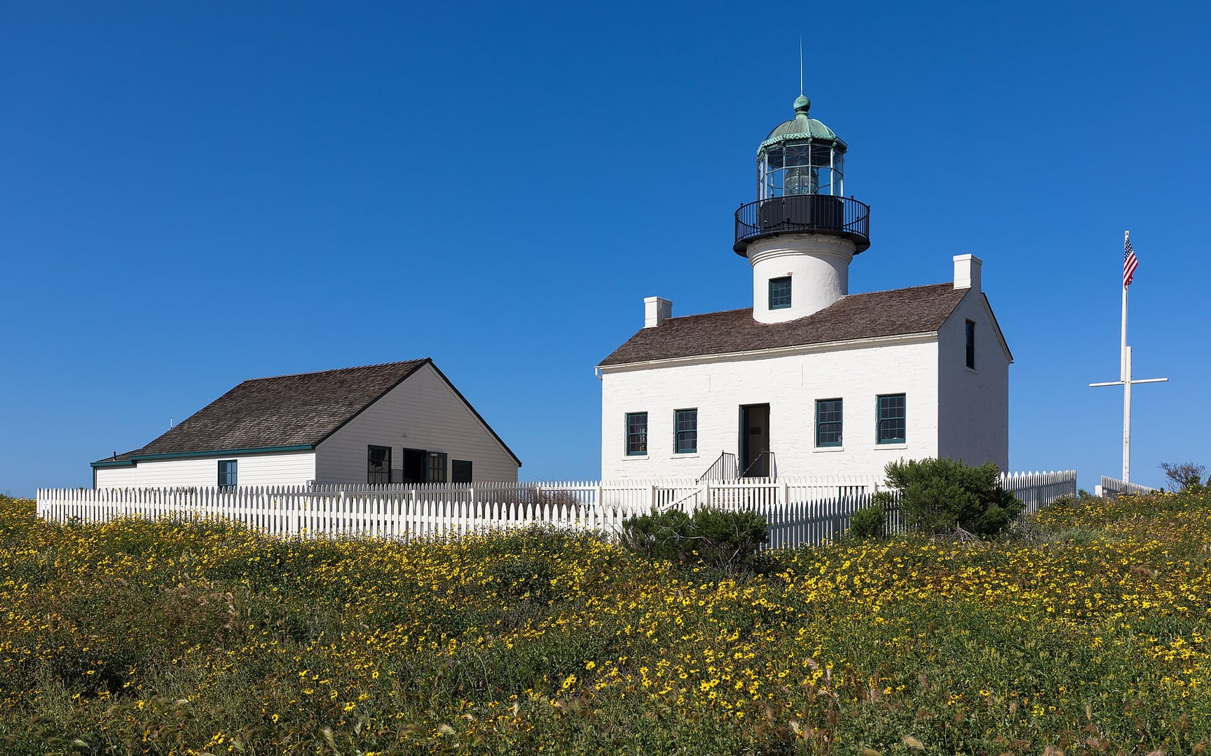 Old Point Loma Lighthouse (1855) — Cape Cod-style light station on the Point Loma peninsula at the mouth of San Diego Bay, part of Cabrillo National Monument