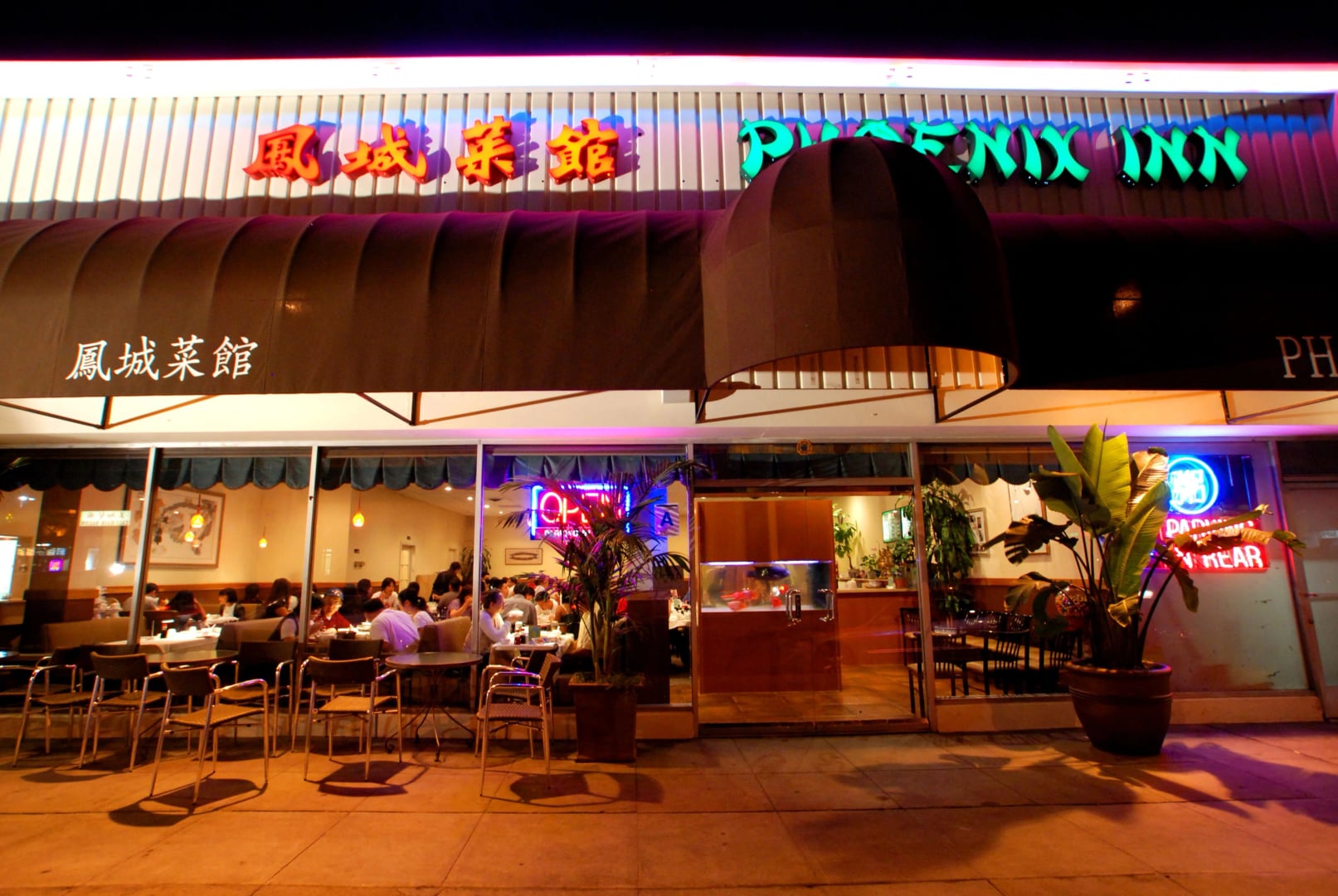 Nighttime storefront of Phoenix Inn Chinese Cuisine at 208 East Valley Boulevard in Alhambra, California
