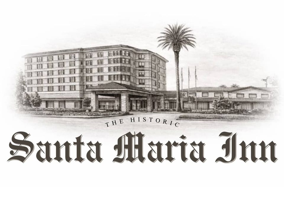 Exterior of the Historic Santa Maria Inn, an early 20th century hotel with Spanish-influenced architecture