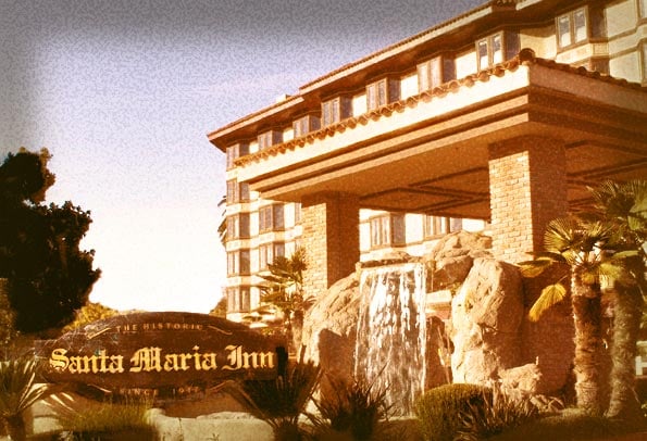 Exterior of the Historic Santa Maria Inn, an early 20th century hotel with Spanish-influenced architecture