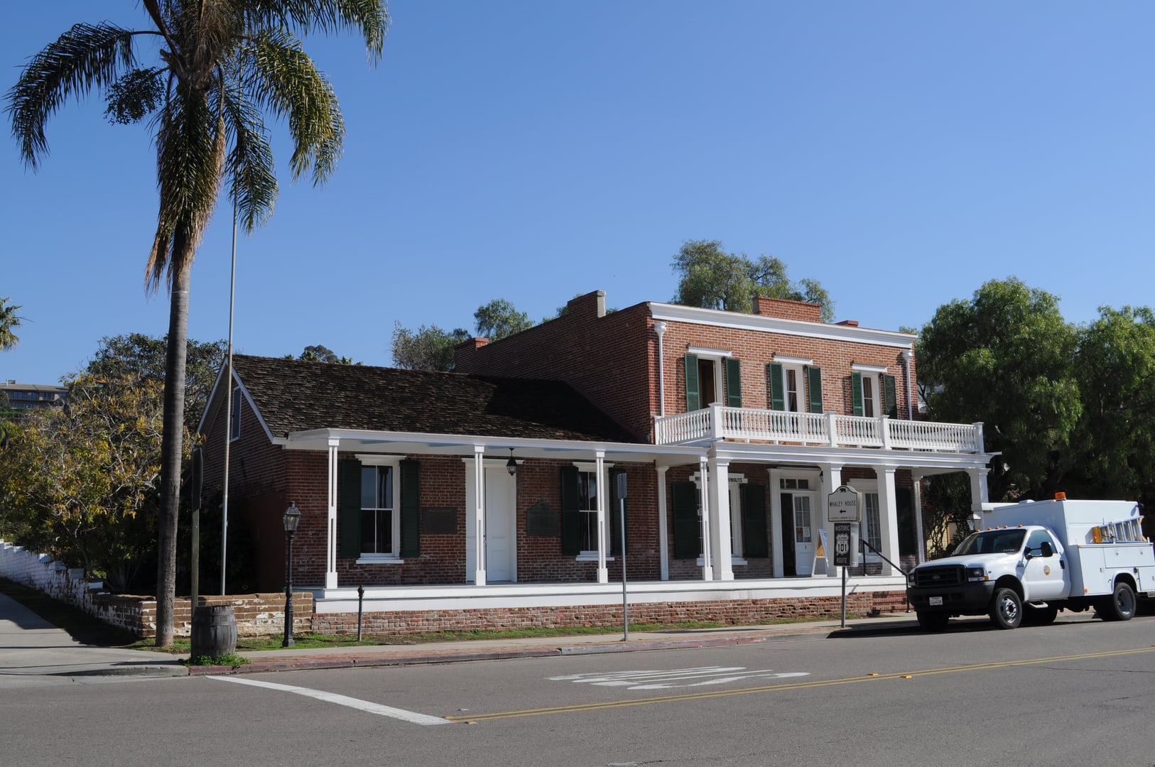 The Whaley House Museum exterior in Old Town San Diego, two-story brick Greek Revival home built 1856