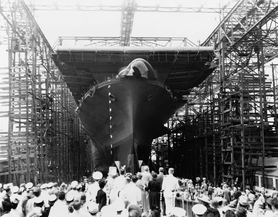 USS Hornet (CV-12) slides down the ways at Newport News Shipbuilding, Virginia, on her launch day, August 30, 1943.