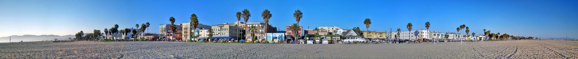 Panoramic view of the Venice Beach boardwalk and shoreline in Los Angeles, California, longtime film and street-culture landmark