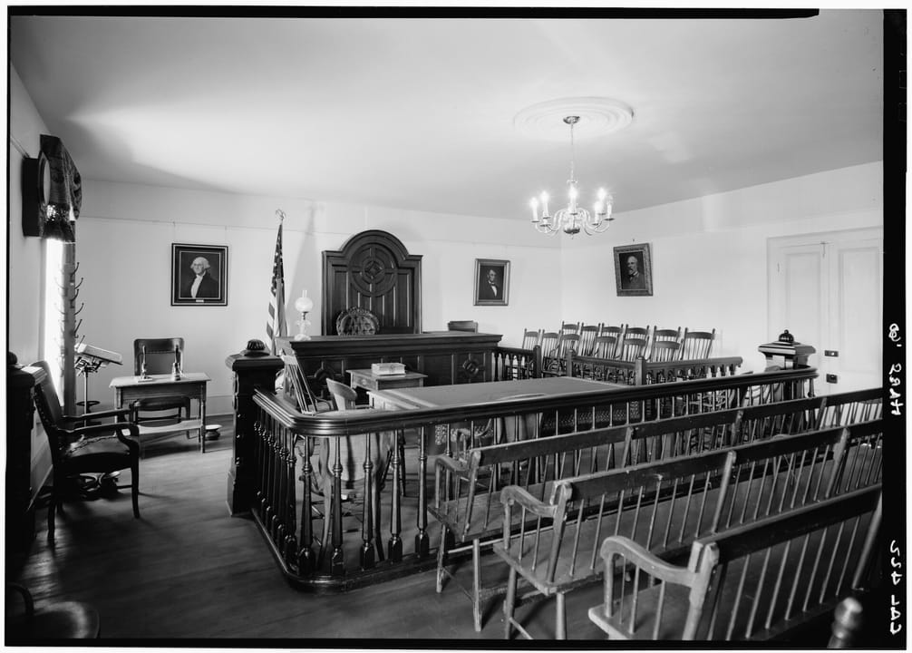The restored courtroom inside the Whaley House, which served as the San Diego County courthouse, photographed for the Historic American Buildings Survey in 1960.