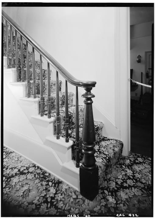 Detail of the carved wood staircase newel post inside the Whaley House, photographed for the Historic American Buildings Survey in 1960.