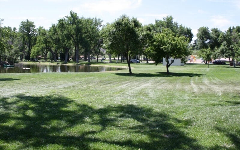 Tree-lined trail along the South Platte River at Riverside Park in Fort Morgan, Colorado