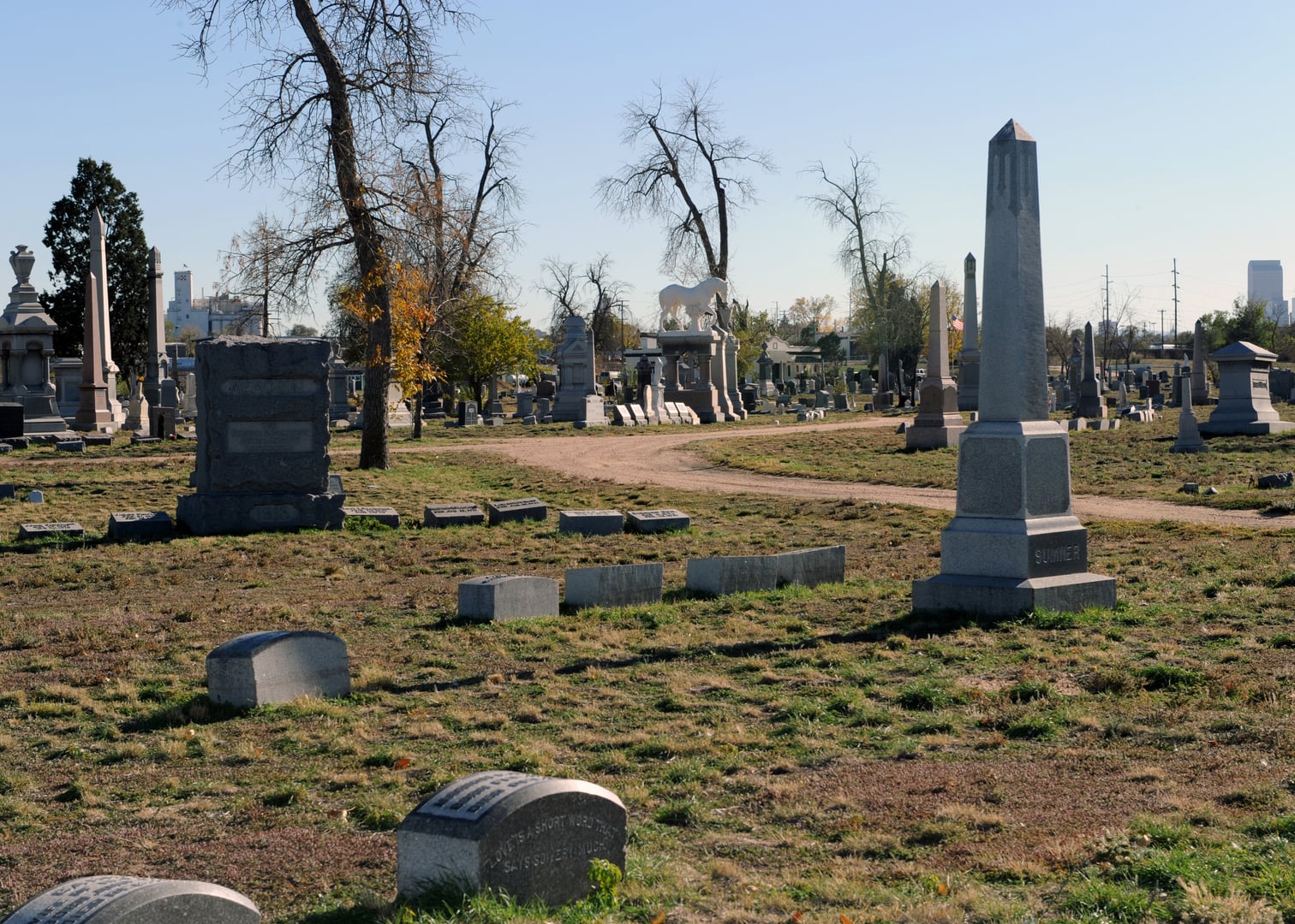 Statues and headstones at the historic Riverside Cemetery in Denver Colorado