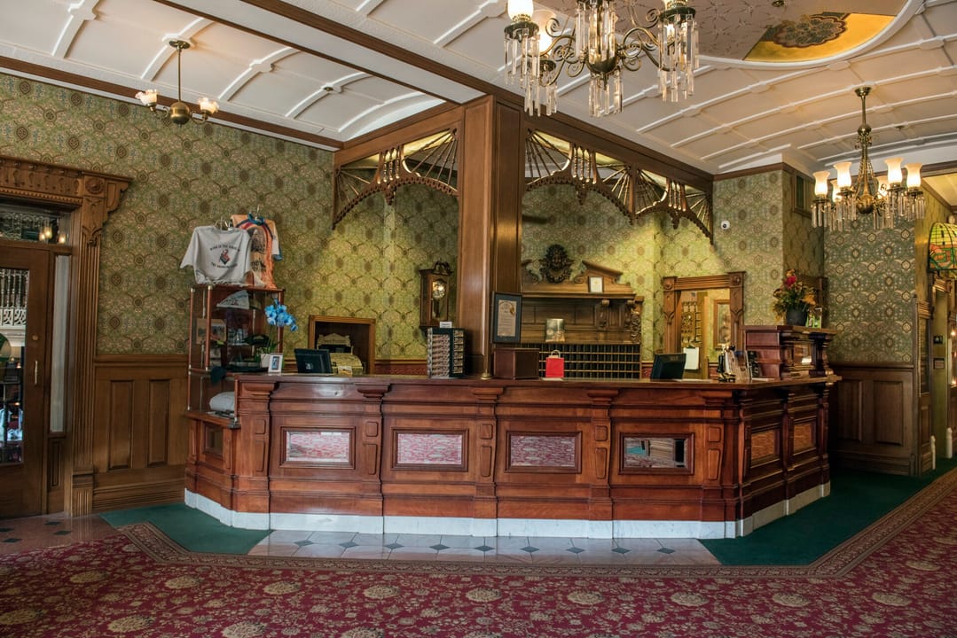 The wooden reception desk in the Strater Hotel's main lobby, Durango, Colorado.