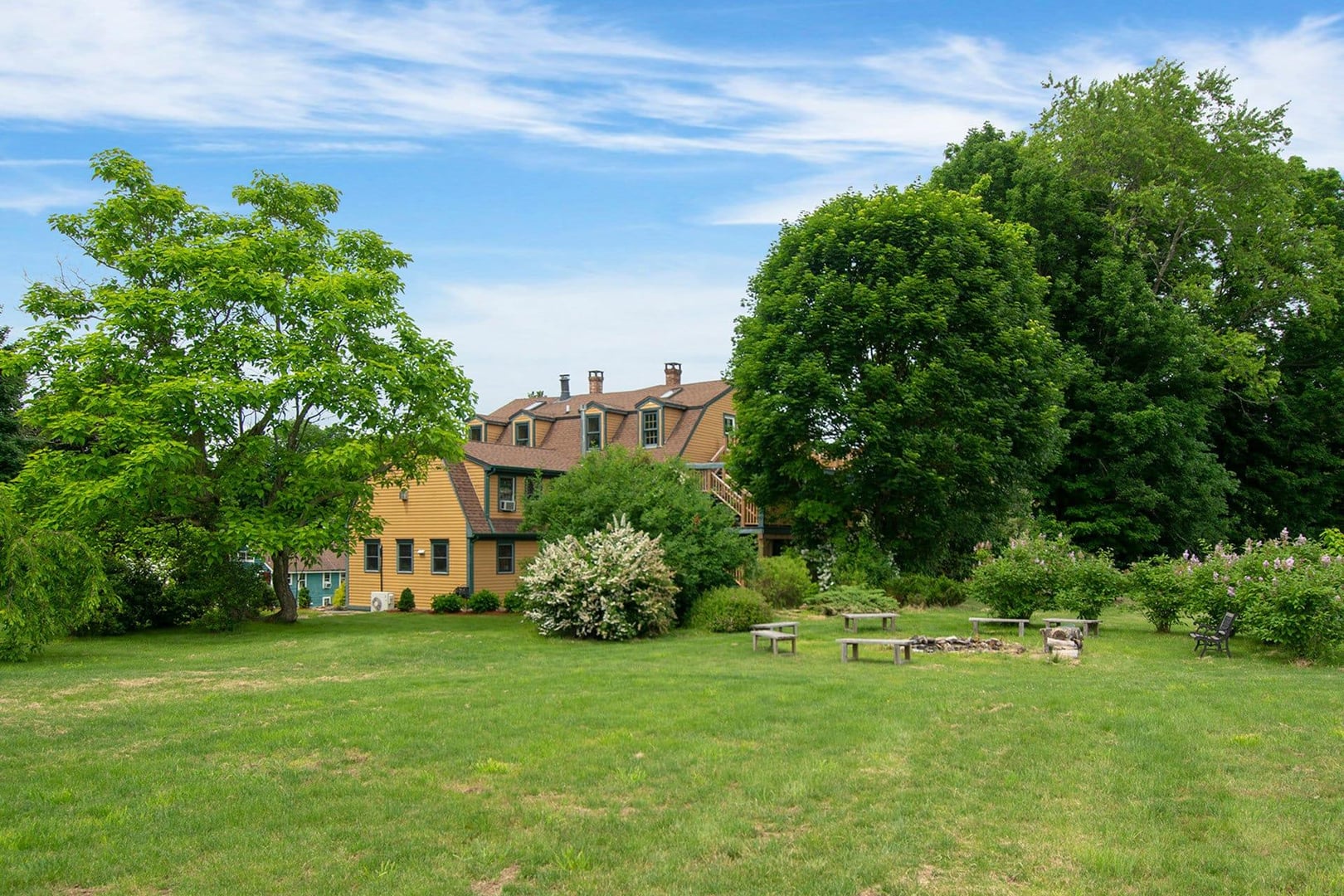 Colonial exterior of Captain Grant's 1754 historic bed and breakfast inn at 109 CT-2A in Preston, Connecticut