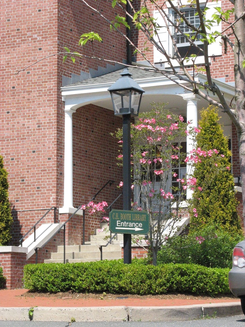 Exterior back entrance of the 1932 Cyrenius H. Booth Library on Main Street in Newtown, Connecticut