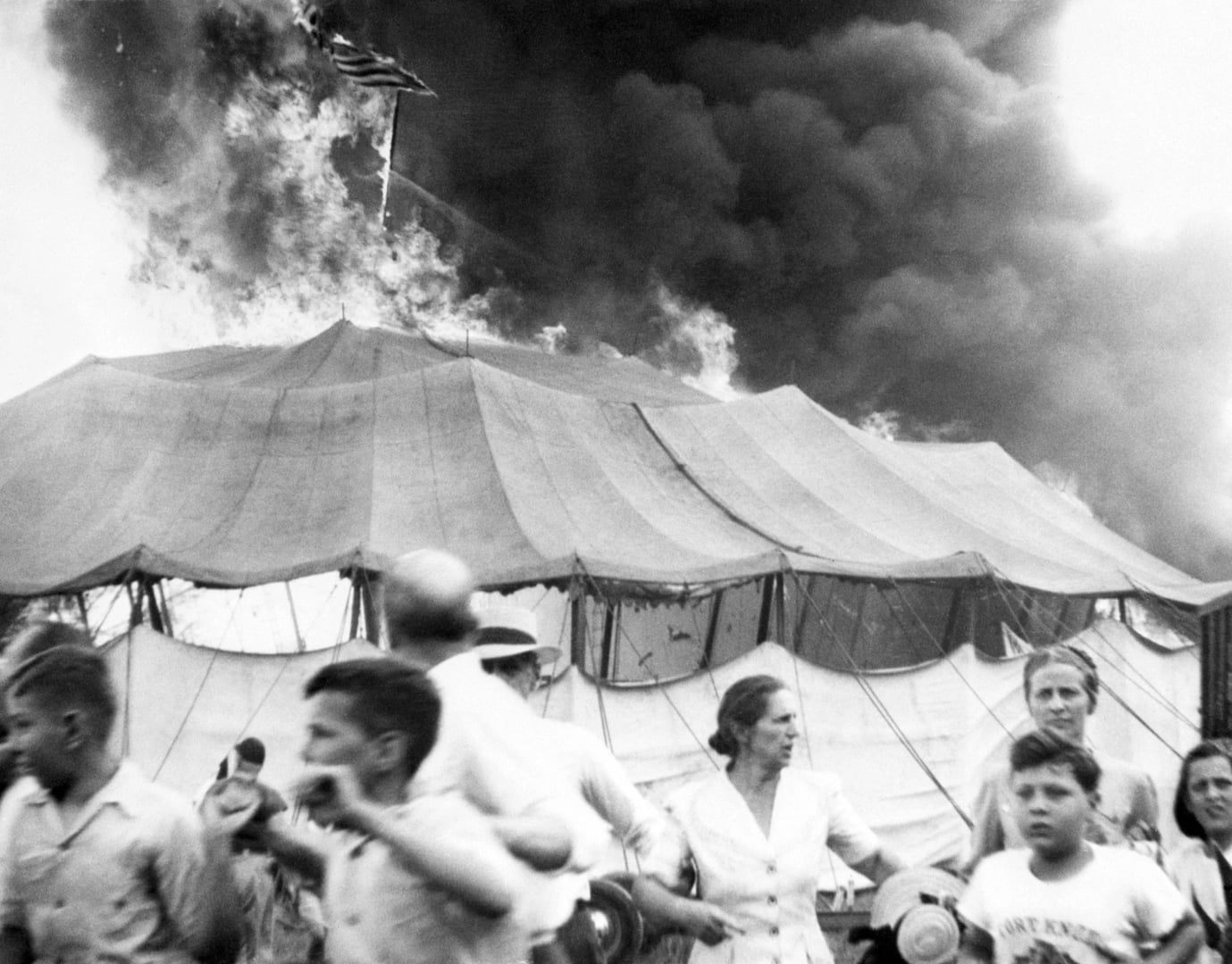 The Hartford Circus Fire Memorial behind the Wish School at 350 Barbour Street in Hartford, Connecticut, with dogwood trees outlining the 1944 Big Top tent and bronze plaques marking the chronology of the fire.