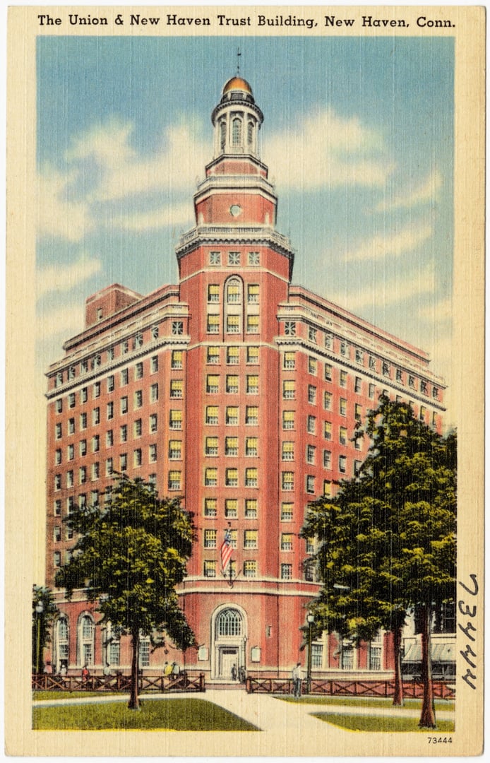 Historic mid-20th-century postcard view of the Union and New Haven Trust Building at Church and Elm Streets in downtown New Haven, Connecticut
