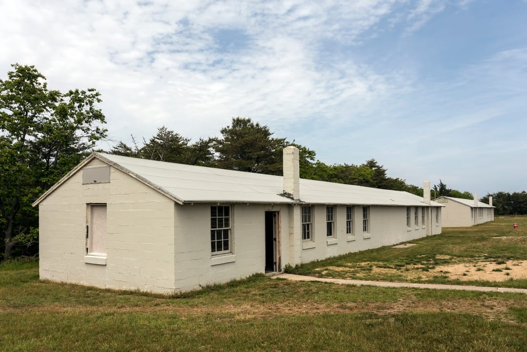 Restored WWII barracks buildings (T-603 and T-604) at Fort Miles, Cape Henlopen State Park.