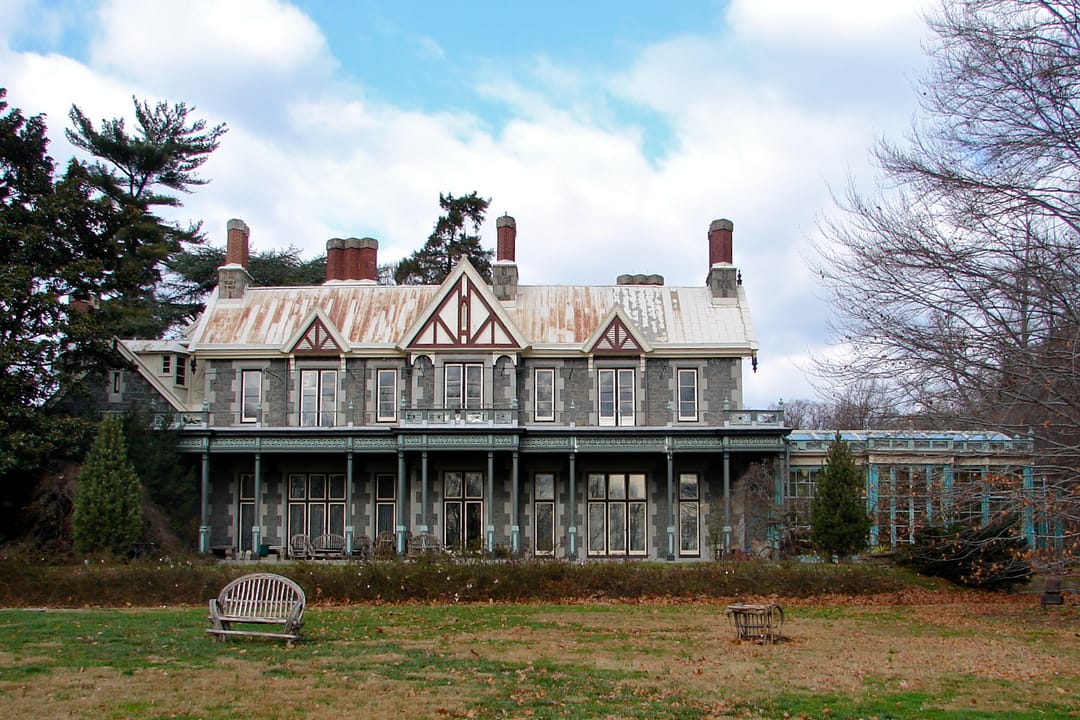 Rockwood Mansion in Wilmington Delaware, Rural Gothic Revival stone house exterior, daylight