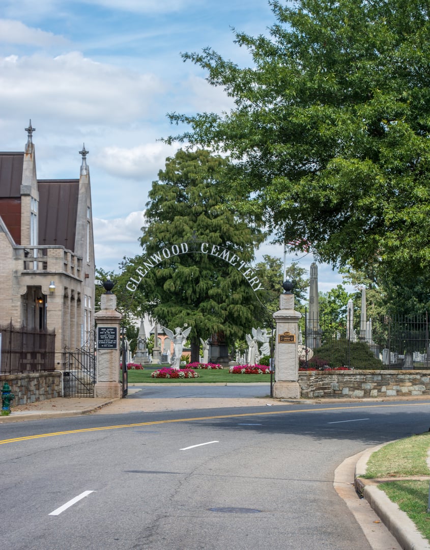 The arched stone entrance gate of Glenwood Cemetery on Lincoln Road NE in Washington, DC
