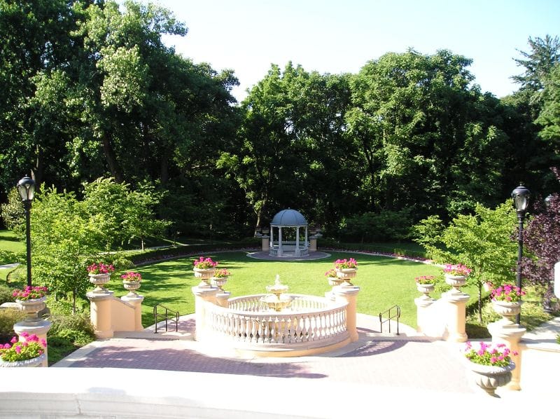 The Omni Shoreham Hotel's formal garden and fountain, with the entrance gazebo, viewed from an upper floor.