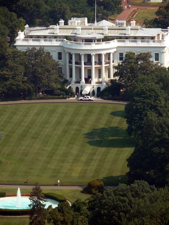 Elevated view of the South Lawn and south portico of the White House, photographed from the Washington Monument.