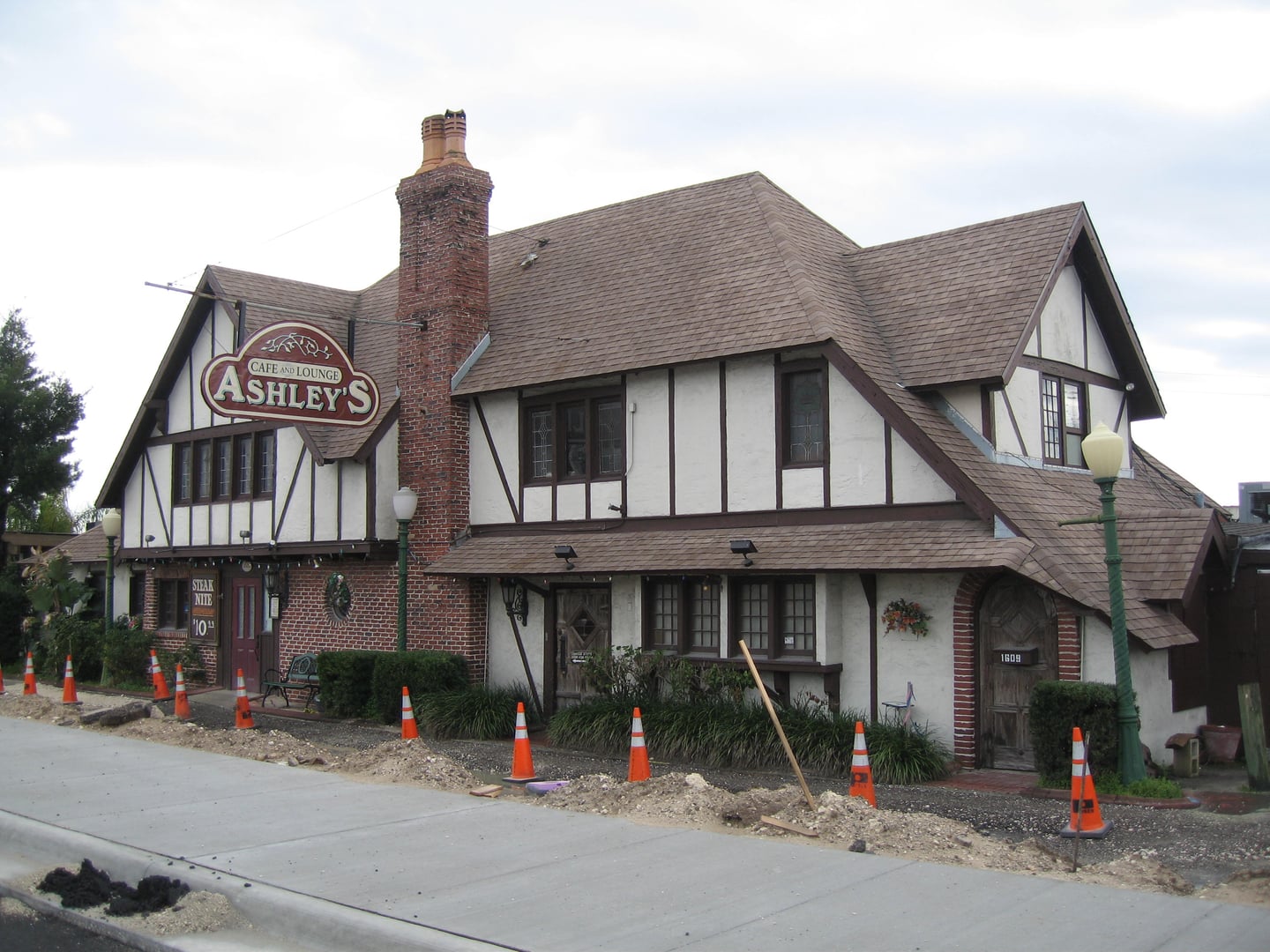 Tudor Revival exterior of Ashley's of Rockledge restaurant at 1609 South US Highway 1 in Rockledge, Florida — operating as a haunted dining landmark since 1933