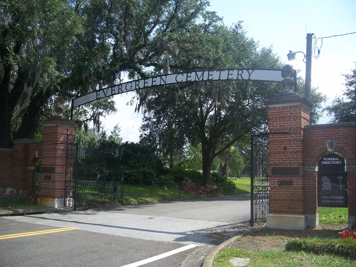 Stone entrance gates of Evergreen Cemetery at 4535 North Main Street in Jacksonville, Florida — an 1880 historic burial ground on the National Register.